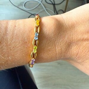 Gold bracelet with multi color gems!